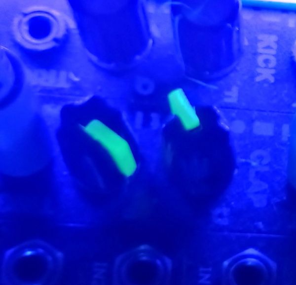 1/8” Shaft black potentiometer knobs with green black light sensitive indicator.