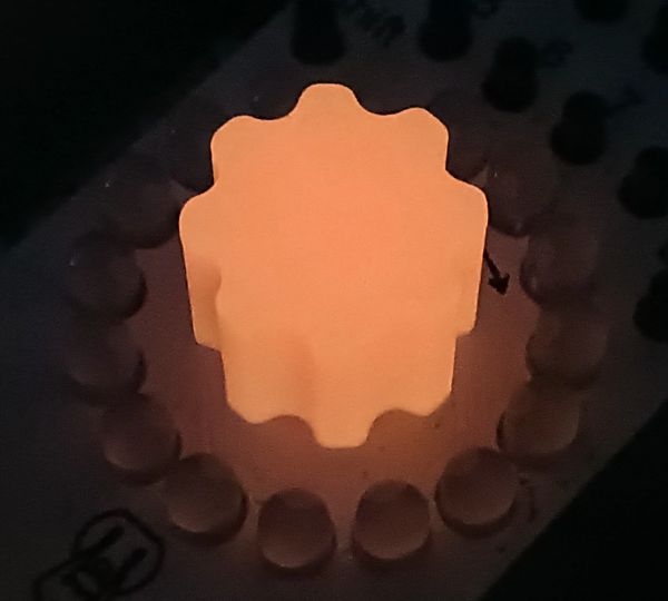 Orange black light sensitive glow in the dark encoder knobs.