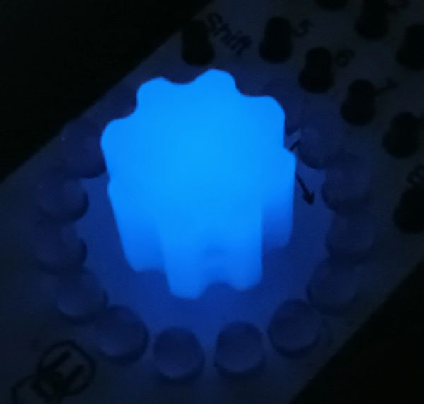 Blue black light sensitive glow in the dark encoder knobs.