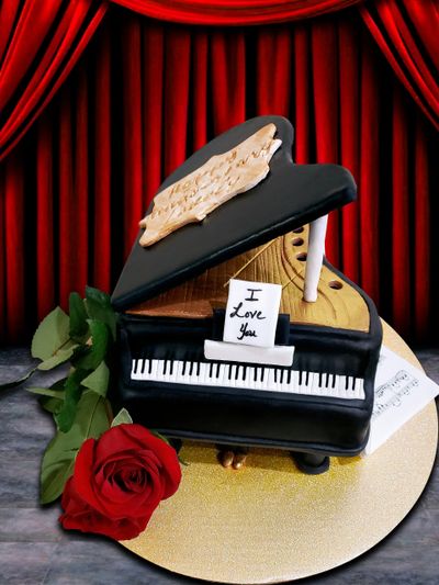 Sculpted elevated piano cake