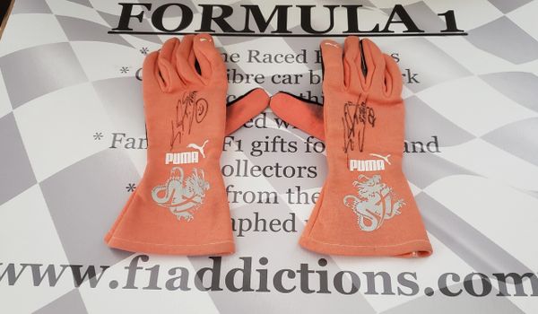 Michael Schumacher worn and signed 2012 Mercedes Puma gloves