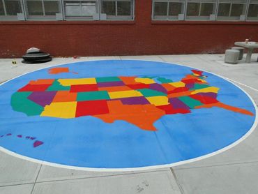Preformed thermoplastic colorful USA Map on concrete in a NYC school playground, by Surface Signs 