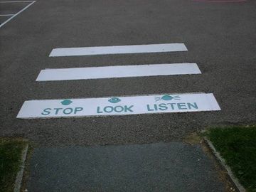 Road Safety pedestrian crossing ground graphics in preformed thermoplastics by Surface Signs of NY