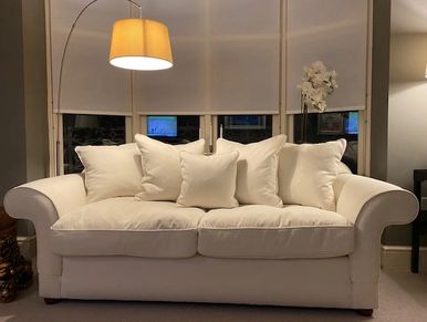 Fleur's simple styled sofa and scatter cushions which we completed using Warwick Key Largo fabric