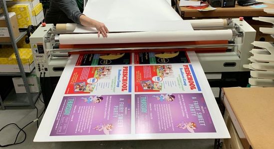 Mounting custom made vinyl posters to foam board using a high production wide-format laminator
