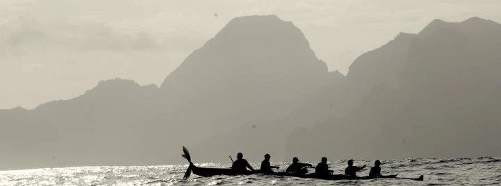 That’s me in the back of the outrigger canoe, part of a team, a family of sort called ‘Ohana’ in Haw