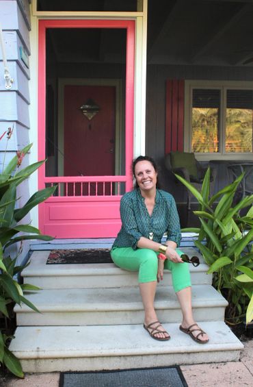 Ali sits on the step leading up to the Blue Lagoon Bungalow.