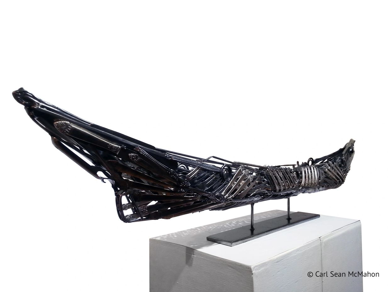 Carl Sean McMahon canoe sculpture with symmetrical metalwork from heirloom silver-plated cutlery