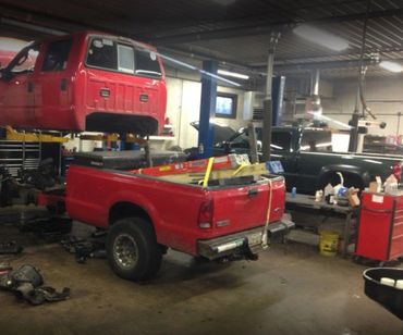 Pick up truck on vehicle lift - North County Service Center - Manchester, Maryland
