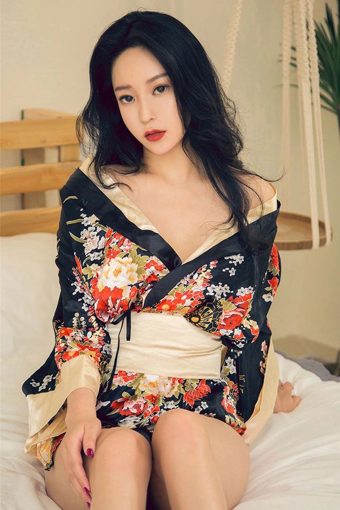 Asian woman dressed in silk robe