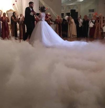 Dancing on a cloud for wedding first dance at Four Columns in Harvey. Calfee Productions