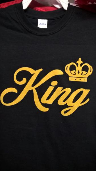 black t shirt gold writing