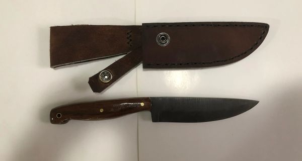 hand forged knife with walnut handles and hand crafted leather sheath