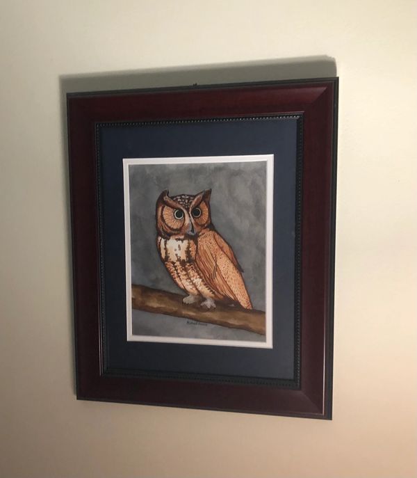 fine art print framed and displayed on a wall