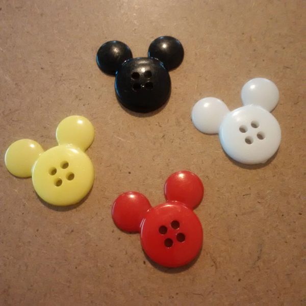 Mickey Mouse buttons in traditional colours.