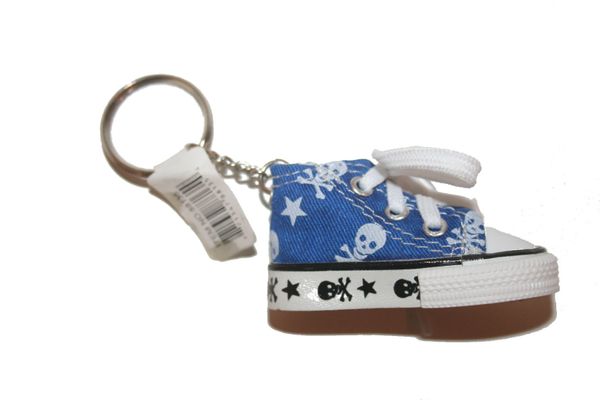 SKULL WITH BONES BLUE SHOE CLEAT KEYCHAIN .. NEW AND IN A PACKAGE