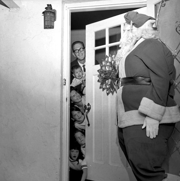 Santa visiting children in the 1960s.