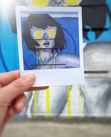 Polaroid picture of mural at Essex Modern City. 