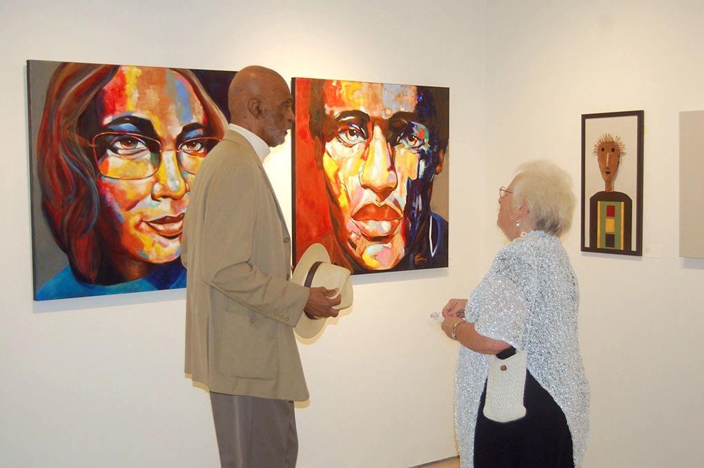 Art gallery from the MUSE with guests enjoying the art. 