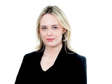 portraits photo of a young business woman photographed against white background