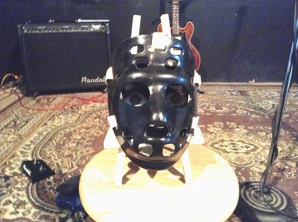 Randy Rhythm Alter Ego Goal Mask on Stage with guitar and Randall Amp