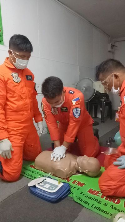 Phil Coast Guard applying First Aid and Basic Life Support  to a dummy