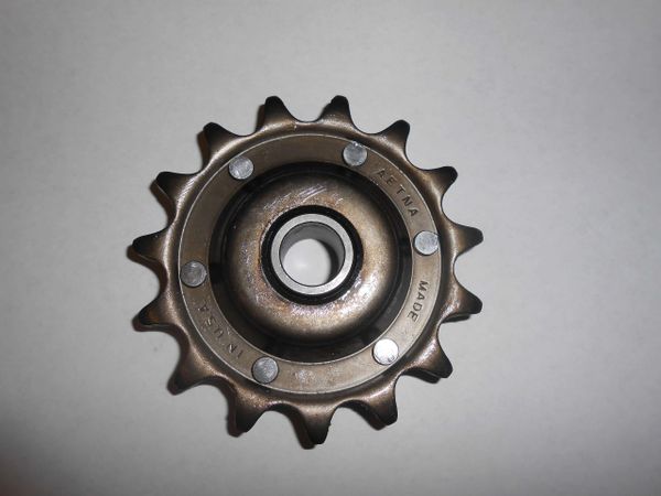 GFI582389R91 Sprocket 15T-60 Idler. Replaces OEM 582389R91 and 86619126. OEM Aetna