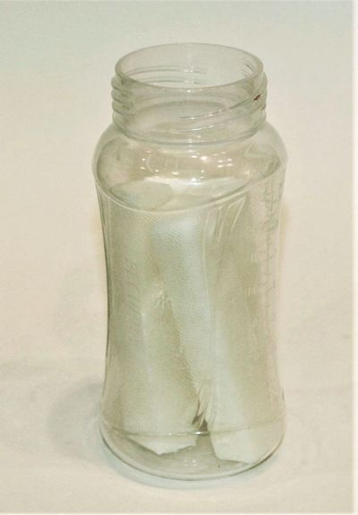 Breast milk frozen bars in a baby bottle