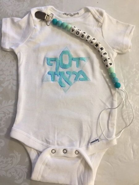 Onesie custom designed and personalized with matching Clip Catcher