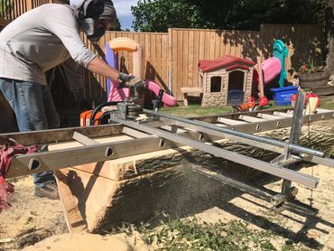 The customer wanted to make a table from the locust tree they were removing.
