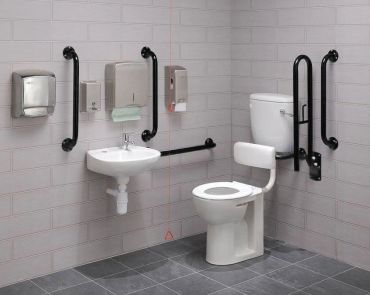 Accessible restroom with support bars and sink.