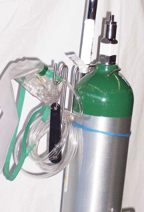 nasal cannula and oxygen tank