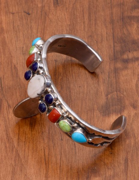 Dead-pawn multi-stone Navajo cuff with heavy silver by Nora Tahe Bill. #0677