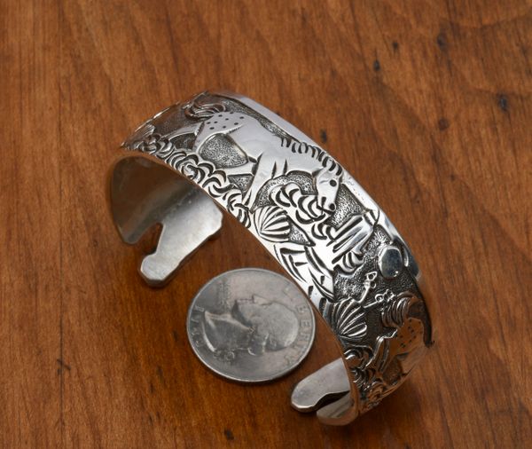 Lloyd Becenti double-overlay Sterling equestrian-scene Navajo cuff. #0805