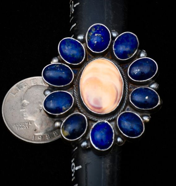 Size 9.5 Navajo Sterling cluster ring with spiney oyster shell surrounded by ten lapis stones. #1035