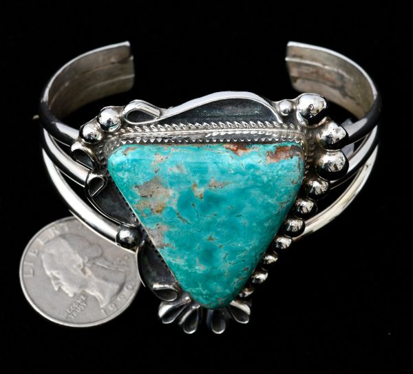 Sterling Navajo cuff with large triangular turquoise stone. SOLD! #1062