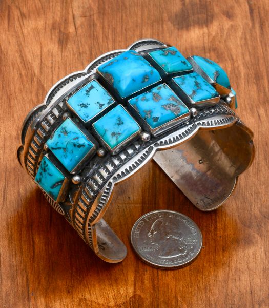 Classic Navajo Sterling cuff with ten square Sleeping Beauty stones, by Andy Cadman. #0670