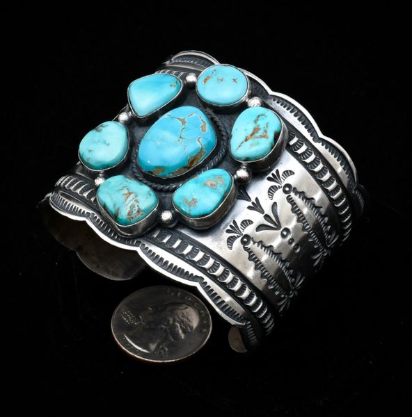 Finely-stamped Andy Cadman Sterling Navajo cuff with seven Royston, Nevada turquoise stones. #1119