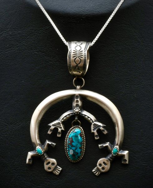 Sterling silver kachina figure "naja" with turquoise and chain. #1152