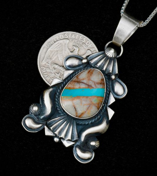 Navajo ribbon turquoise pendant with repousse' silverwork. SOLD! #1236