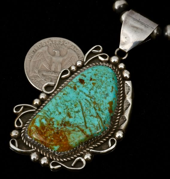 Dead-pawn Sterling Navajo pendant with Royston, Nevada turquoise. #1283