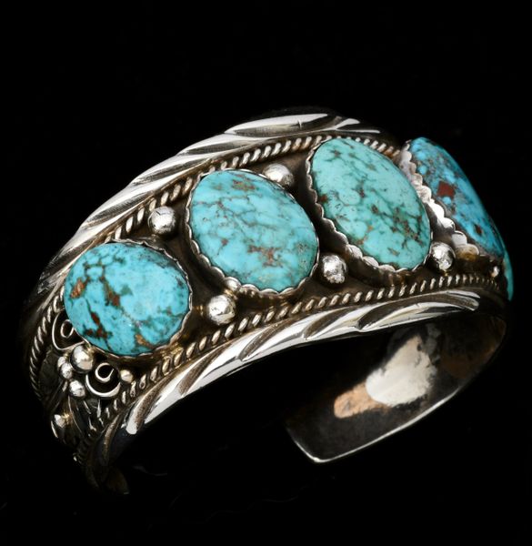 Five-stone Navajo row cuff with Kingman turquoise; 7-inch circumference. SOLD! #1316