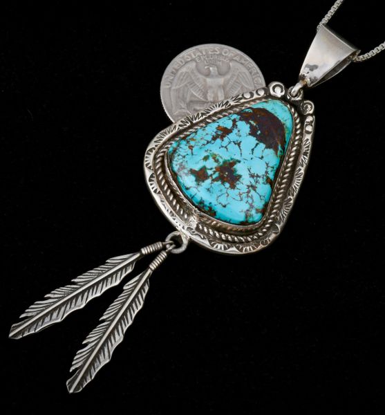 Navajo dead-pawn turquoise feathered pendant and chain. #1347