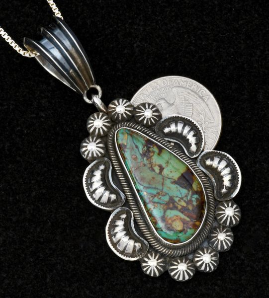Medium size Navajo turquoise pendant (and chain) with repousse' #1495