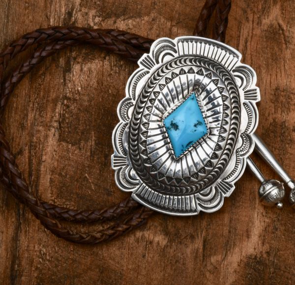 3-inch by 2-inch intricately hand-stamped Navajo pawn bolo tie, by Carson Blackgoat. SOLD!