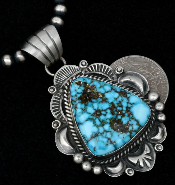 Triangular Navajo water-web turquoise hand-stamped pendant with reverse-stamped repousse' #1620