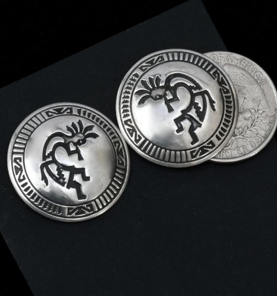 Domed Sterling Navajo studs with hand-stamped Kokopelli figures. #1654