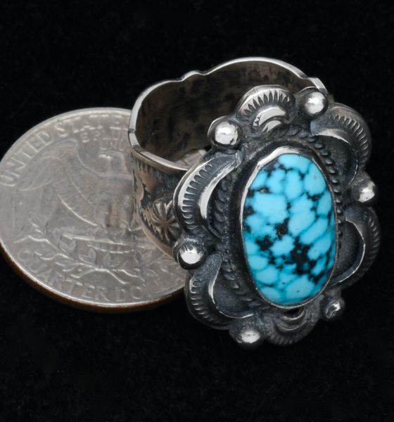 Elaborate size 8.5 Navajo ring with black-web Kingman turquoise. #1728