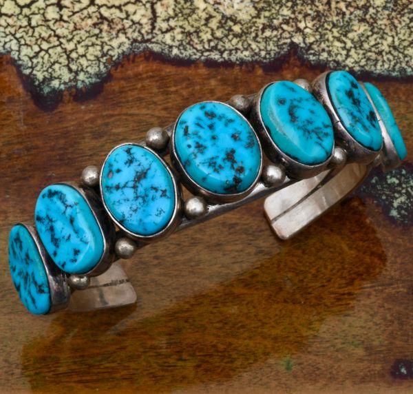 Navajo dead-pawn seven stone row cuff with Sleeping Beauty turquoise. #1753