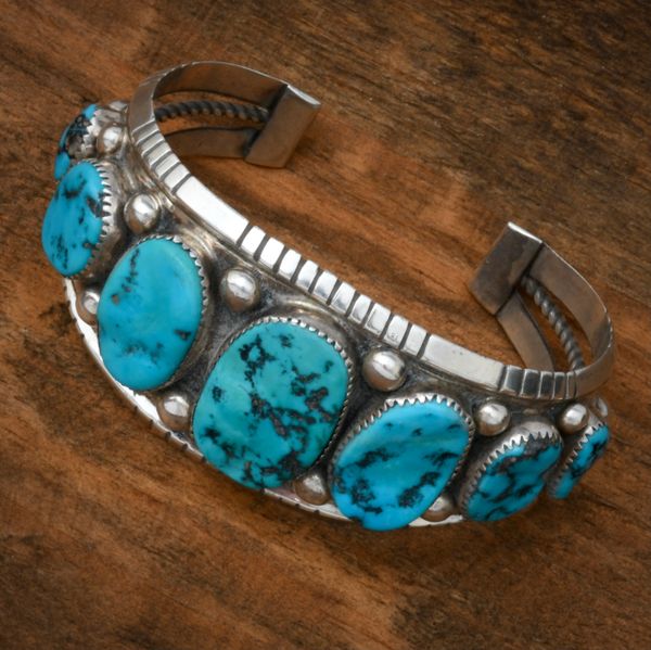 Dead-pawn seven-stone Sleeping Beauty turquoise Navajo cuff. #1784